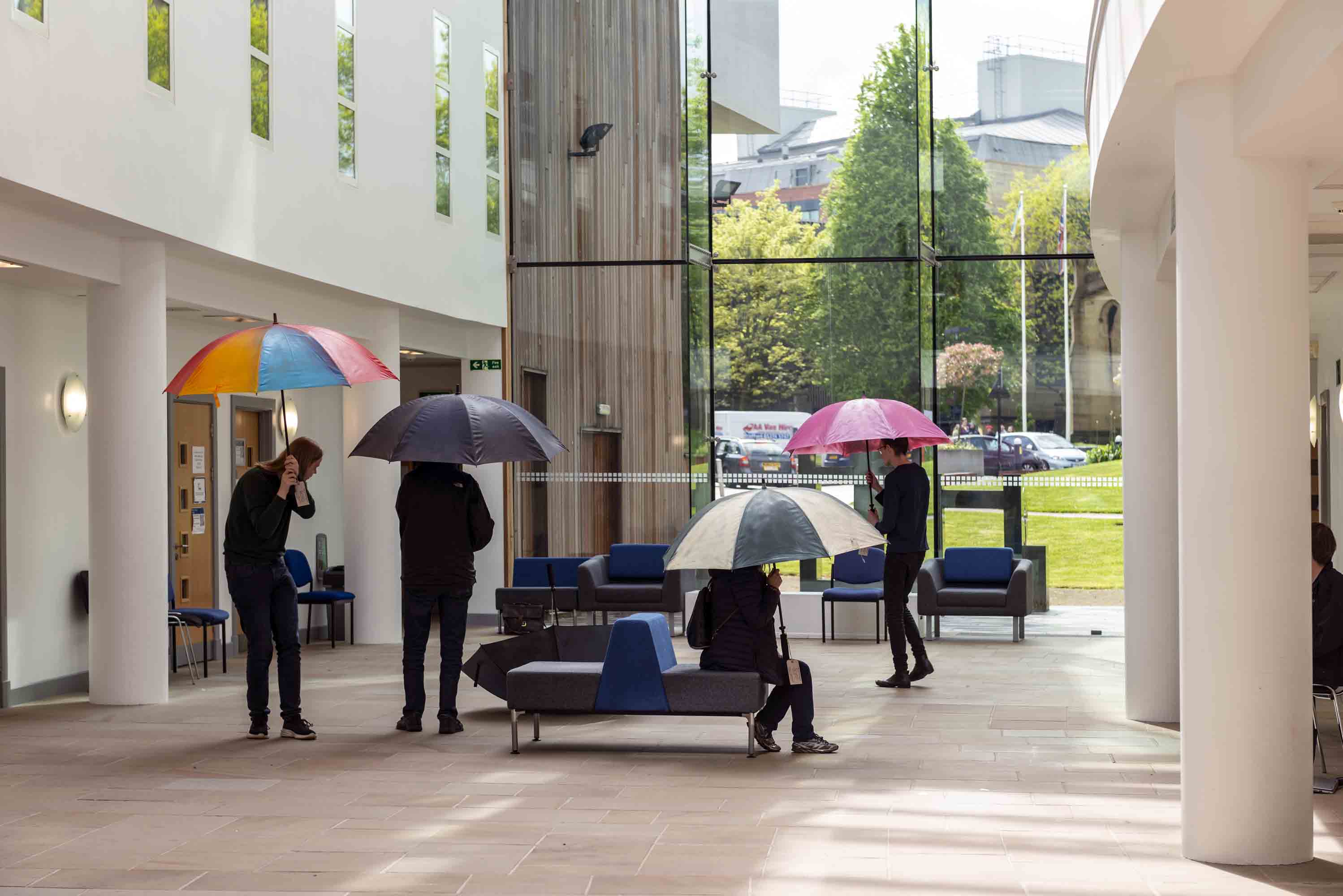 In progress photo of Five Umbrellas installation