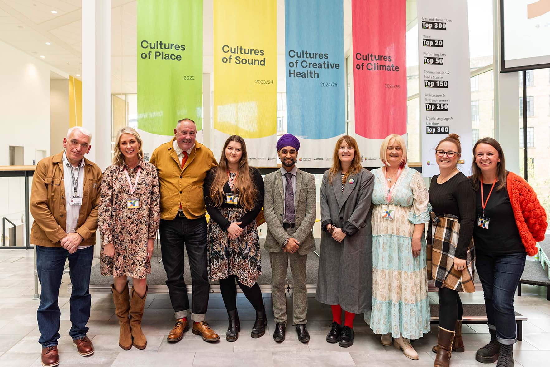 A group of people smiling at the camera